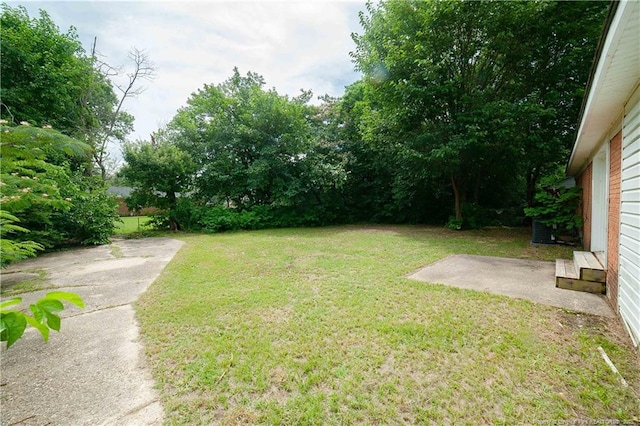6310 Glenlea Cir, Fayetteville, NC 28314 - view of grassy yard with a patio