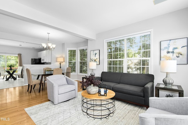 5545 Crabtree Park Ct, Raleigh, NC 27612 - living area featuring a chandelier, light wood-type flooring, and beamed ceiling