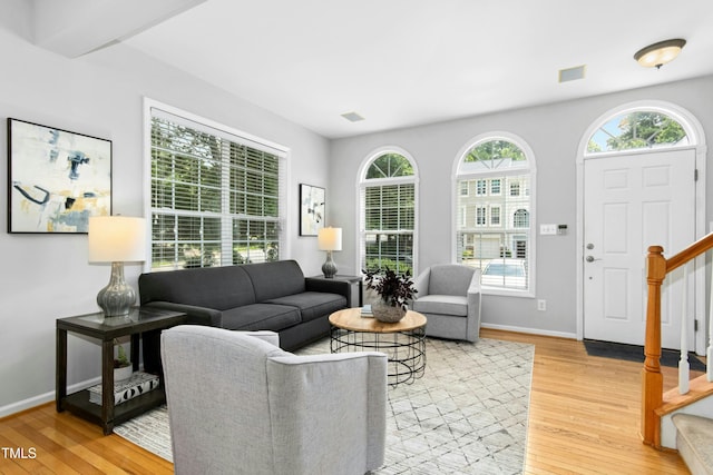 5545 Crabtree Park Ct, Raleigh, NC 27612 - living area with stairway and light wood finished floors