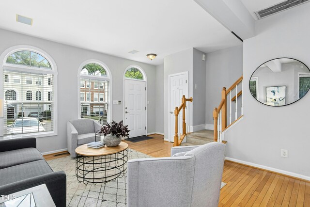 5545 Crabtree Park Ct, Raleigh, NC 27612 - living area with plenty of natural light, light wood-type flooring, and stairway