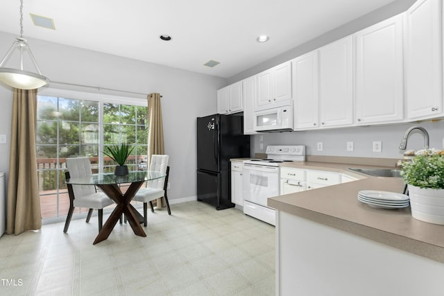 5545 Crabtree Park Ct, Raleigh, NC 27612 - kitchen with white appliances, white cabinets, pendant lighting, light floors, and recessed lighting