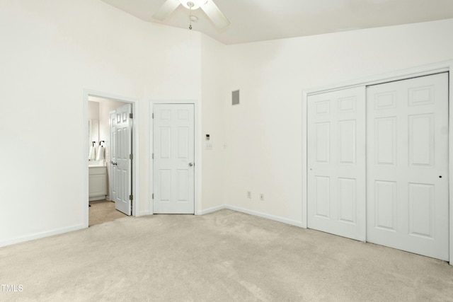 5545 Crabtree Park Ct, Raleigh, NC 27612 - unfurnished bedroom featuring carpet flooring, ensuite bath, ceiling fan, a towering ceiling, and a closet