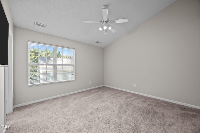 3408 Sosa Rd, Raleigh, NC 27610 - spare room with carpet, a ceiling fan, and vaulted ceiling