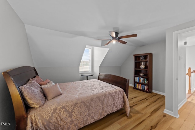 541 Mallie Pearce Rd, Zebulon, NC 27597 - bedroom with wood finished floors, lofted ceiling, and ceiling fan
