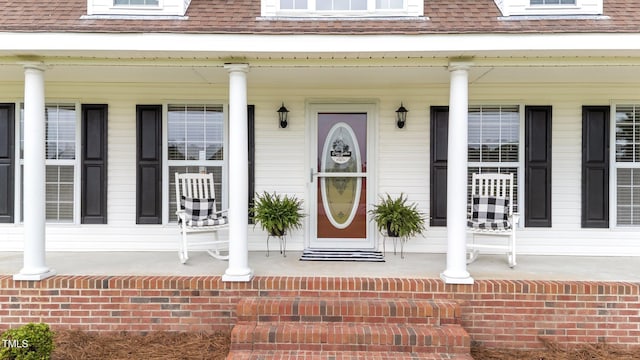 541 Mallie Pearce Rd, Zebulon, NC 27597 - entrance to property featuring covered porch and roof with shingles