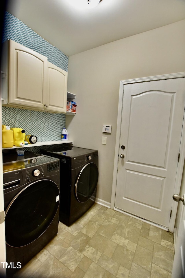 83 Mariners Point Way, Garner, NC 27529 - laundry area with cabinet space, washing machine and clothes dryer, and light stone finish flooring