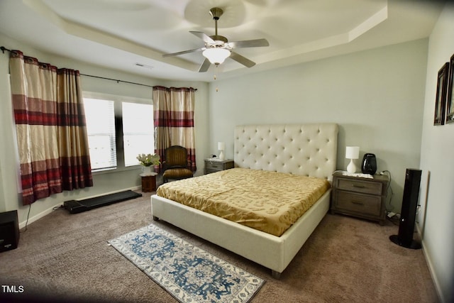 83 Mariners Point Way, Garner, NC 27529 - bedroom with a tray ceiling, carpet floors, and ceiling fan