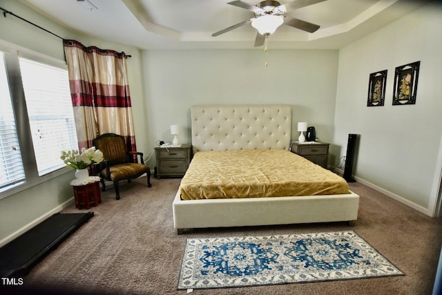 83 Mariners Point Way, Garner, NC 27529 - bedroom with carpet flooring, a tray ceiling, and a ceiling fan
