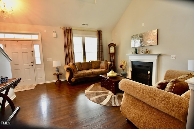 83 Mariners Point Way, Garner, NC 27529 - living room with dark wood-type flooring, a fireplace, and high vaulted ceiling