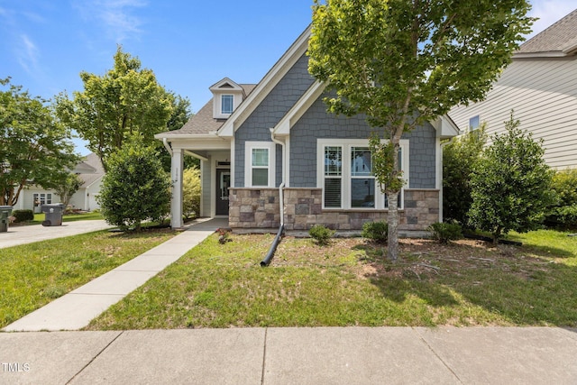 1172 Pemberly Ave, Morrisville, NC 27560 - craftsman inspired home featuring stone siding and a front lawn