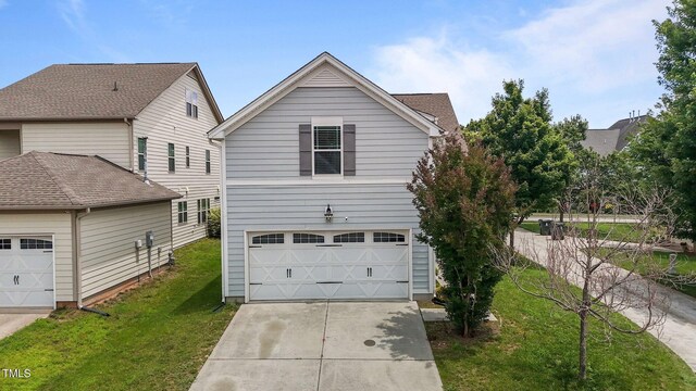 1172 Pemberly Ave, Morrisville, NC 27560 - view of front of property featuring a garage, a front yard, and driveway