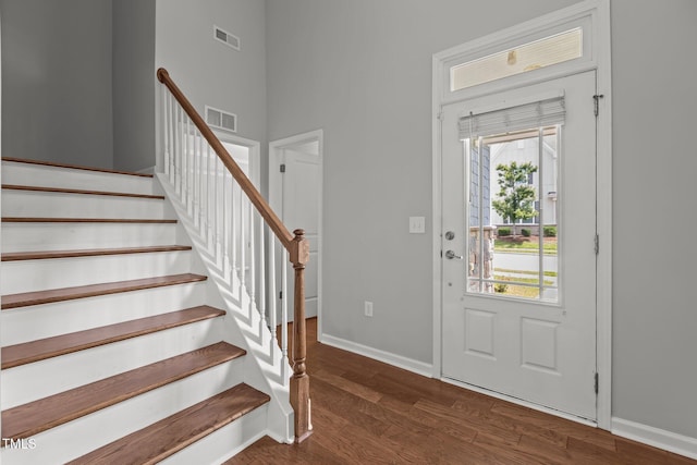 1172 Pemberly Ave, Morrisville, NC 27560 - foyer entrance with dark wood-style floors and stairs