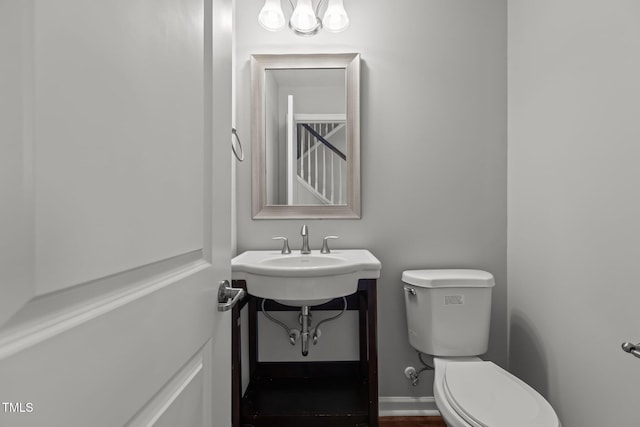 1172 Pemberly Ave, Morrisville, NC 27560 - half bathroom featuring toilet and a sink