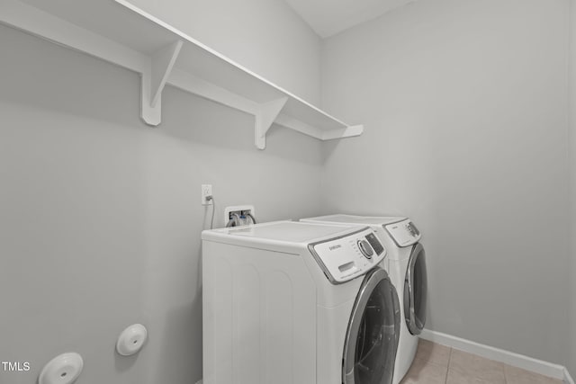 1172 Pemberly Ave, Morrisville, NC 27560 - washroom featuring independent washer and dryer and light tile patterned floors