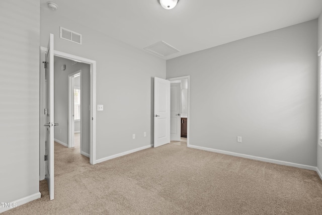 1172 Pemberly Ave, Morrisville, NC 27560 - unfurnished bedroom featuring attic access and light carpet