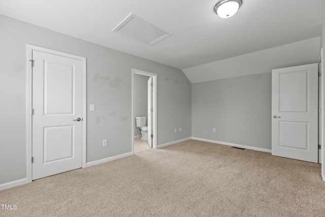 1172 Pemberly Ave, Morrisville, NC 27560 - additional living space featuring light colored carpet, vaulted ceiling, and attic access