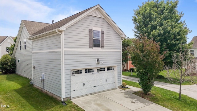 1172 Pemberly Ave, Morrisville, NC 27560 - view of side of property with a lawn, driveway, a garage, and roof with shingles