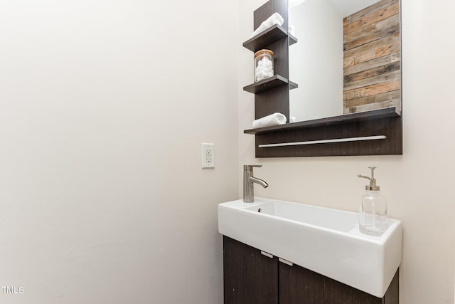 202 Chapel Valley Ln, Apex, NC 27502 - bathroom featuring vanity and wood walls