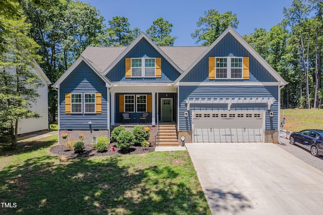 1176 Sagamore Dr, Louisburg, NC 27549 - craftsman house featuring a porch, driveway, a front lawn, board and batten siding, and crawl space