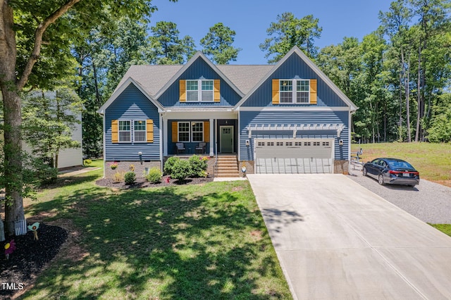 1176 Sagamore Dr, Louisburg, NC 27549 - craftsman house featuring concrete driveway, covered porch, a front yard, and a garage