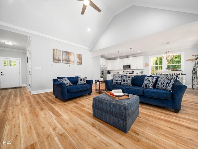 1176 Sagamore Dr, Louisburg, NC 27549 - living area with ceiling fan, recessed lighting, plenty of natural light, light wood-type flooring, and high vaulted ceiling