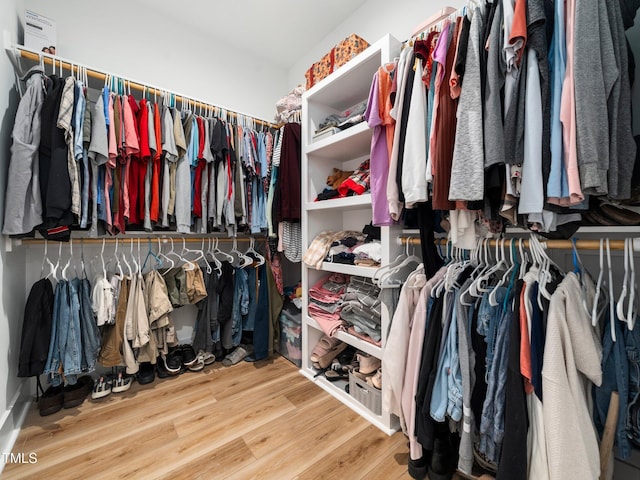 1176 Sagamore Dr, Louisburg, NC 27549 - spacious closet featuring wood finished floors