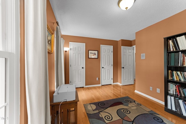 116 Lost Tree Ln, Cary, NC 27513 - entryway with wood finished floors and a textured ceiling