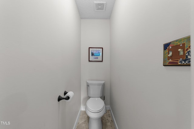 116 Lost Tree Ln, Cary, NC 27513 - bathroom featuring a textured ceiling and tile patterned floors