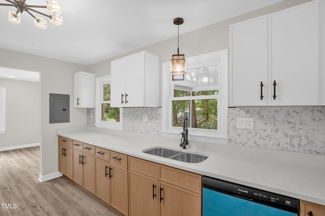 1605 Nixon St, Durham, NC 27707 - kitchen featuring electric panel, dishwasher, a chandelier, light countertops, and backsplash
