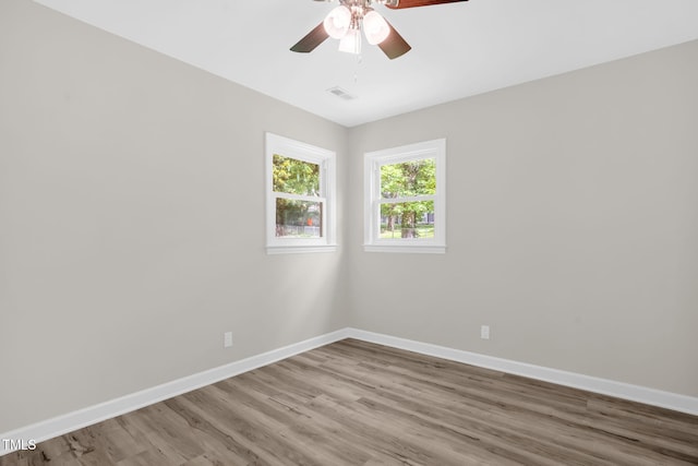 1605 Nixon St, Durham, NC 27707 - empty room with ceiling fan and wood finished floors