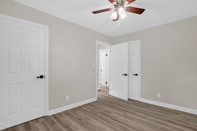 1605 Nixon St, Durham, NC 27707 - unfurnished bedroom with wood finished floors and ceiling fan