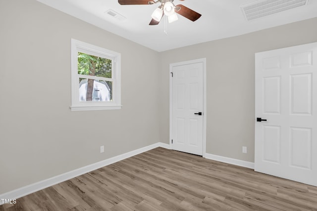 1605 Nixon St, Durham, NC 27707 - unfurnished bedroom featuring wood finished floors and ceiling fan