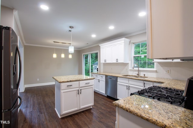 5200 Fieldwood Ct, Raleigh, NC 27616 - kitchen featuring fridge with ice dispenser, dishwasher, a center island, crown molding, and dark wood-style floors