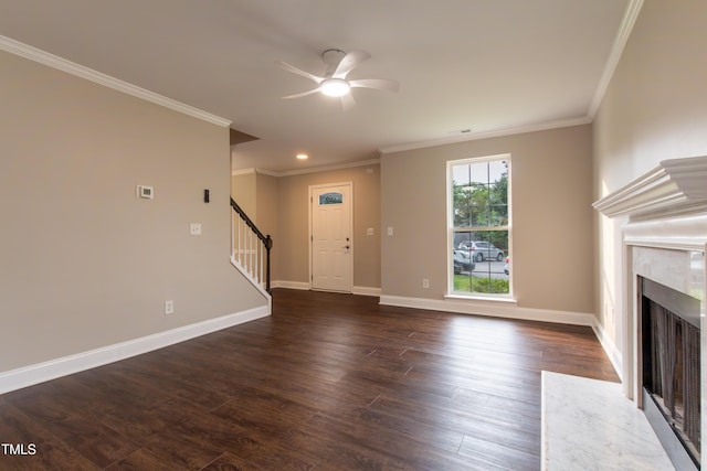 5200 Fieldwood Ct, Raleigh, NC 27616 - unfurnished living room featuring stairs, ceiling fan, dark wood finished floors, ornamental molding, and a high end fireplace