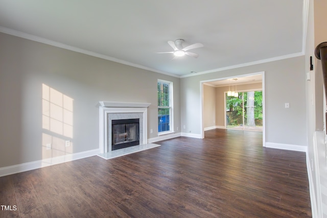 5200 Fieldwood Ct, Raleigh, NC 27616 - unfurnished living room featuring a ceiling fan, dark wood-type flooring, a fireplace, ornamental molding, and a chandelier