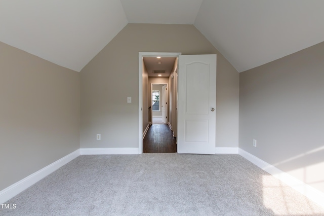 5200 Fieldwood Ct, Raleigh, NC 27616 - bonus room with dark colored carpet and vaulted ceiling
