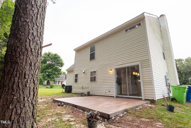 5200 Fieldwood Ct, Raleigh, NC 27616 - back of house featuring a wooden deck and a chimney