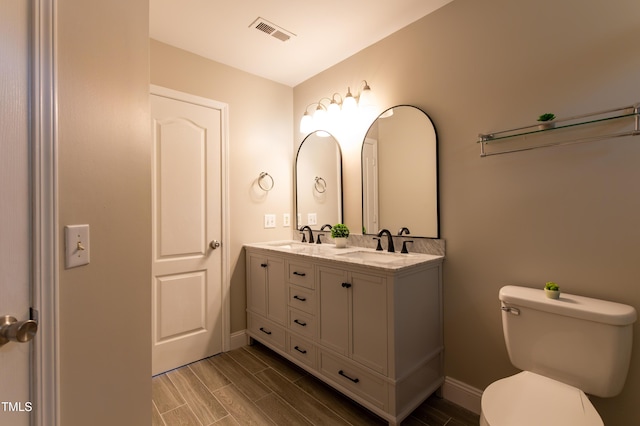 5200 Fieldwood Ct, Raleigh, NC 27616 - bathroom with toilet and double vanity