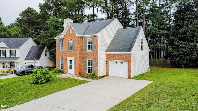 5200 Fieldwood Ct, Raleigh, NC 27616 - view of front of property with a front lawn, a chimney, driveway, and brick siding
