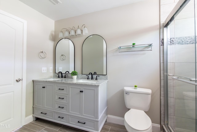5200 Fieldwood Ct, Raleigh, NC 27616 - full bath with tiled shower, double vanity, and wood tiled floors