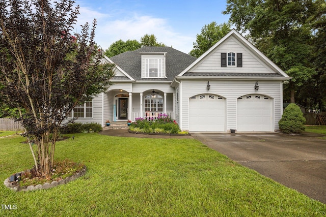 8116 Mosby Way, Willow Springs, NC 27592 - traditional-style house with roof with shingles, a porch, driveway, a front lawn, and a garage