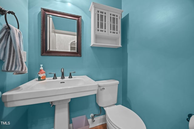 8116 Mosby Way, Willow Springs, NC 27592 - half bath featuring toilet and wood finished floors