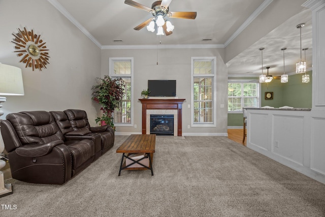 8116 Mosby Way, Willow Springs, NC 27592 - living room with carpet flooring, ceiling fan, a tile fireplace, and ornamental molding