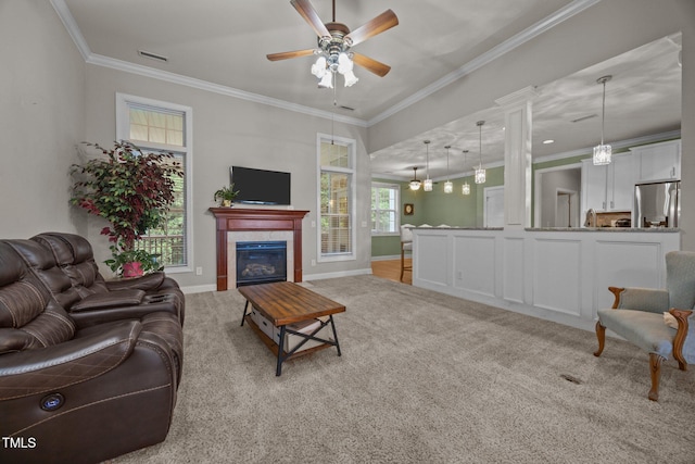 8116 Mosby Way, Willow Springs, NC 27592 - living room with light carpet, ornamental molding, a ceiling fan, and a fireplace
