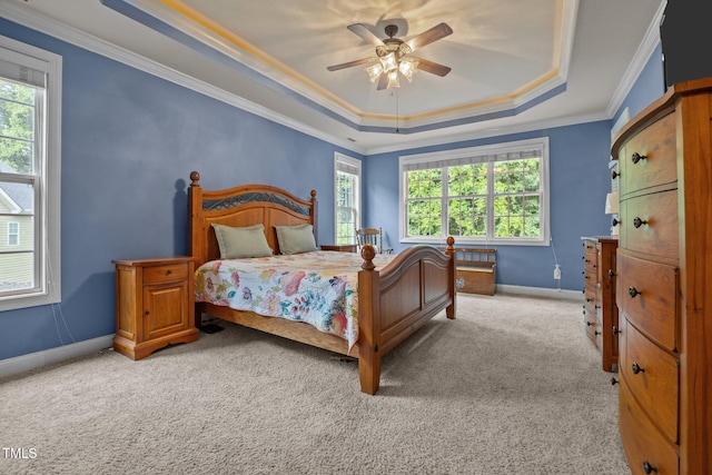 8116 Mosby Way, Willow Springs, NC 27592 - bedroom with a raised ceiling, multiple windows, light carpet, crown molding, and ceiling fan