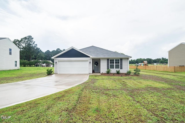 2319 Minnie Hall Rd, Autryville, NC 28318 - single story home with concrete driveway and an attached garage