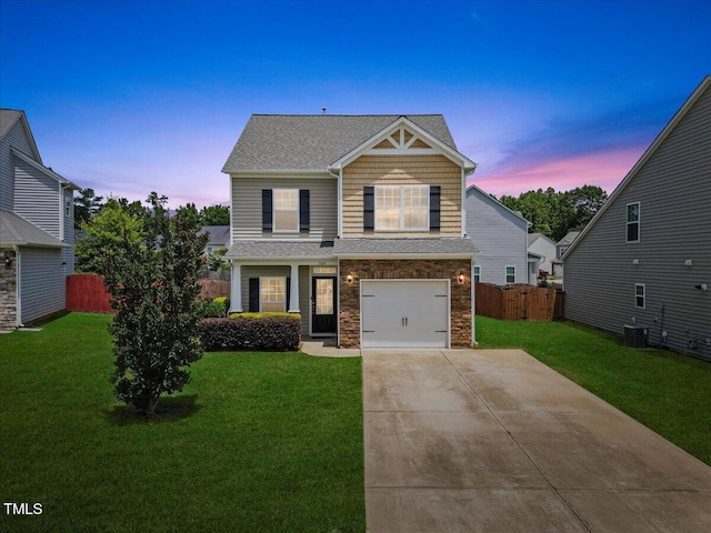 504 Gumview Cir, Fuquay Varina, NC 27526 - craftsman-style house with concrete driveway, stone siding, roof with shingles, and an attached garage