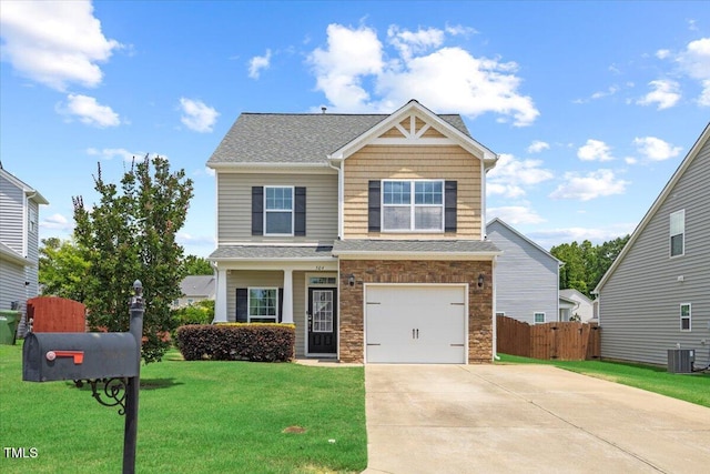 504 Gumview Cir, Fuquay Varina, NC 27526 - view of front of property featuring stone siding, concrete driveway, and a garage