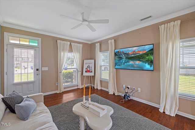504 Gumview Cir, Fuquay Varina, NC 27526 - living area with wood finished floors, a ceiling fan, and crown molding