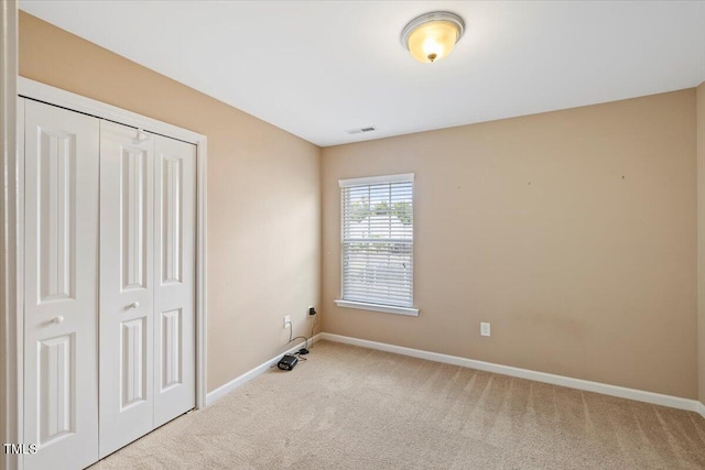 504 Gumview Cir, Fuquay Varina, NC 27526 - unfurnished bedroom featuring carpet flooring and a closet